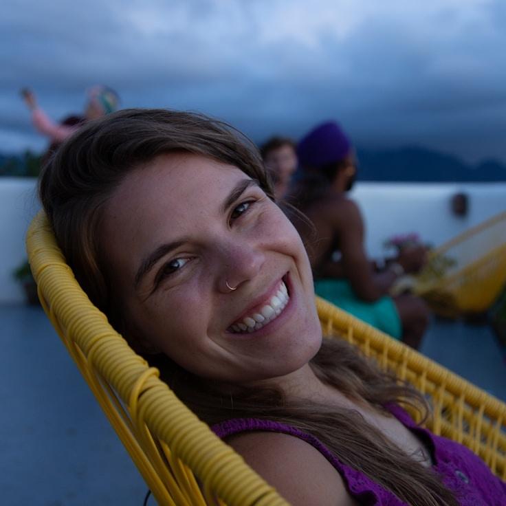 Alex Chen, Lead Design Curator at SavvyStreamLab, reviewing corporate floral arrangements